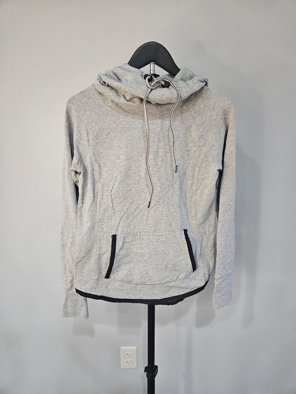 Athleta Sentry Cowl Neck Hoodie Sweatshirt in a light gray heather color.